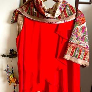 Red Joseph Ribkoff sleeveless blouse.